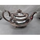 A Silver Georgian teapot with ivory insulators fluted decoration 825 grams Birmingham hall mark