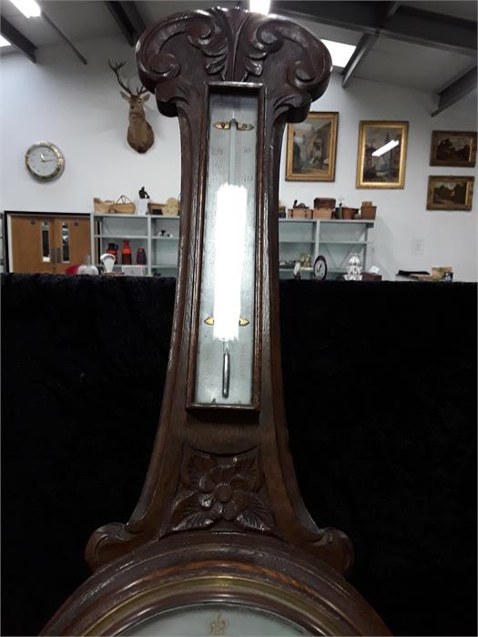 A banjo barometer in a carved oak case. - Image 2 of 2