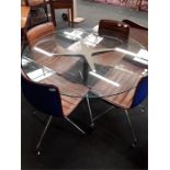 A chrome 1960's design dining table with circular glass top, Eames under licence for Vitra