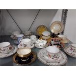 A quantity of cabinet cups and saucers to include Dresden, Mintons gold, Copelands, Derby Shelley,