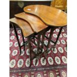 A nest of three Edwardian inlaid mahogany side tables, resting on square legs.