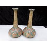 A pair of Royal Doulton blue and brown vases impressed marks to base. A/F.