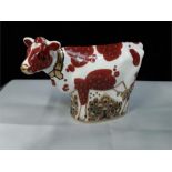 A Royal Crown Derby paperweight Daisy Cow boxed.