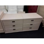 A modern leather chest of six drawers.