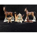 A small quantity of glazed china animals to include German horses, Afghan Hound etc.