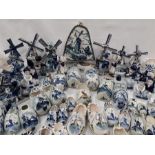 A large collection of Delftware to include clogs, windmills and Dutch girls and boys.