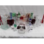 Various glassware to include vases, glasses and ornaments.