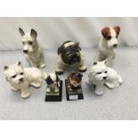 A collection of ornamental dogs.