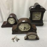 Four mantle clocks.