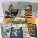 Elton John Selection Of Collectables. Here we have 2 x LP Records signed by Elton. This lot contains
