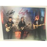 U2 Atributed Signed Photo. A nice set of all 4 members of the band here (Bono - Edge - Larry Mullens