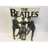 Beatles EMI Shop Display Item. This B/W cardboard cut-out stands 16” x 11” and Has a crease across