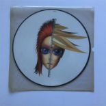 David Bowie Picture Disc 12" Single. A great rare picture disc from Bowie here called 'Rebel Never