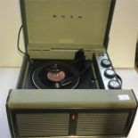 Bush Portable Vinyl Record Player. HEre we have a Full auto changer record deck with all speeds made