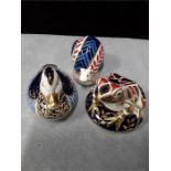 Crown Derby paperweights: blue Imari style duckling white stopper, Crown Derby snail ceramic white