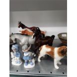 A quantity of Beswick buff, gray tan, horses and some other china ornaments.