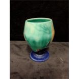 A Clarice Cliff Bizarre blue and green vase in the isis pattern (af).