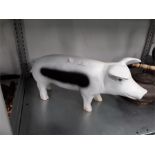 A resin shop display pig.