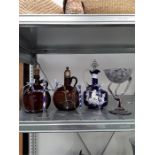 A quantity of decorative glassware, Bristol glass design friggers birds, brown glass flagons, modern