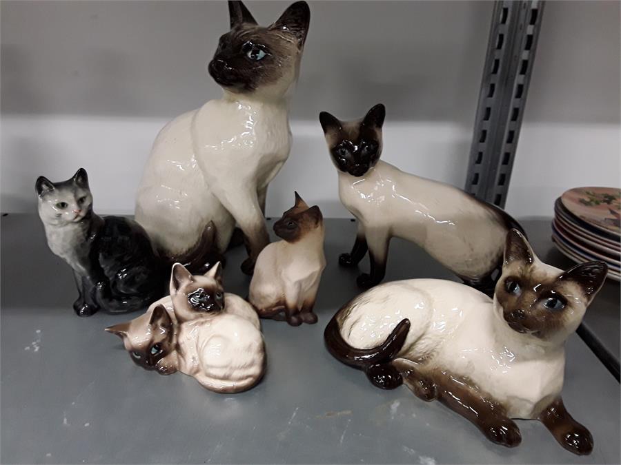 Six Beswick, Doulton Siamese cats.