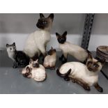 Six Beswick, Doulton Siamese cats.