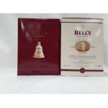 Two boxed and sealed Bell's limited edition Christmas 2000 decanter depicting Arthur Bell.