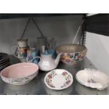 A quantity of mixed Poole Pottery. inc plates, tea pot etc