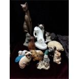 A quantity of cat figures including Royal Doulton images of nature. brass, resin.