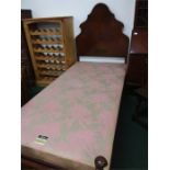 A mahogany single bedstead with a Vibase mattress support.