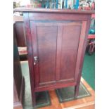 A mahogany pot cupboard.