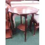 A mahogany occasional table together with another.