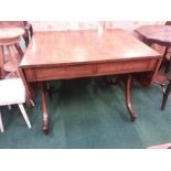 A twin drawer sofa table with inlaid edgings