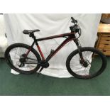 A Saracen mountain bike. 24 speed with front suspension and hydraulic disc brakes. (R5)