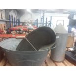 A galvanized tin tub together with two other items.