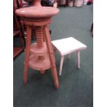 A white painted stool by reynolds of ludlow together with a pine twist rise and fall stool.