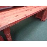 A large pine kitchen table.
