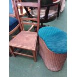 A Lloyd Loom by Lusty kidney shaped laundry basket together with a chair.