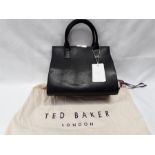 A black Ted Baker handbag. (26)