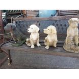 A collection of dog garden statues.
