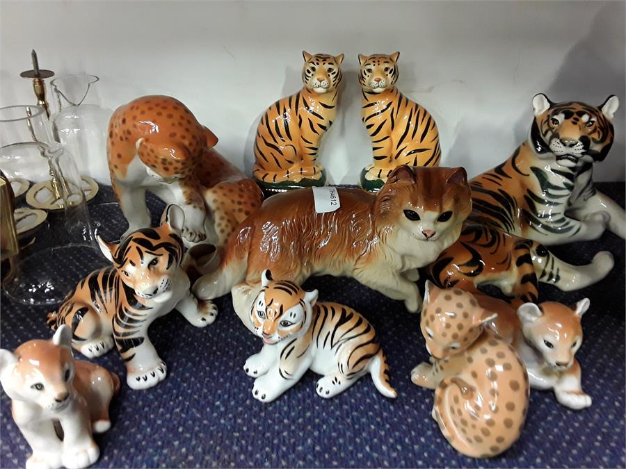 Various ornaments of cats and tigers.