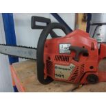 A Husqvarna 141 petrol chainsaw.