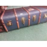 A wood bound travel case.