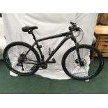 A Specialized Rockhopper mountain bike. 20 speed with front suspension and hydraulic disc brakes.