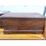 A teak storage box with two drawers.