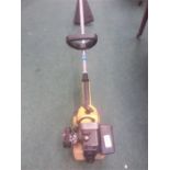 A Mac 65SL petrol strimmer.