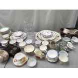 A basket of assorted china and glassware. Includes: Spode, Shelley, Royal Doulton, Colclough and