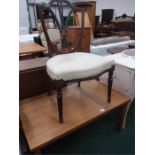 A coffee table together with a vintage chair.