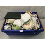 A box containing a large quantity of ornaments and china including a number of plates and bowls by