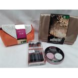 A No7 weekend collection, Sanctuary Spa wash bag containing body wash, body scrub and body butter,