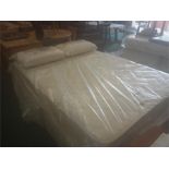 A Myers double divan bed with a Mystique unsprung mattress with two Dunlopillos.